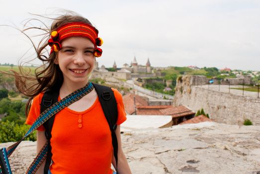 Ukrainian teen girl staying outdoors
