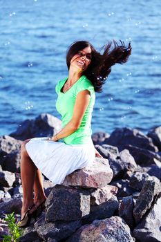 woman relax blue sea and bubbles on background