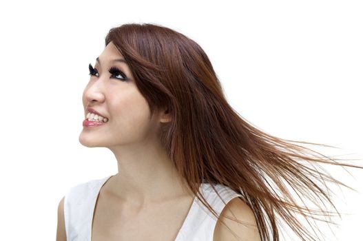 Cute woman thinking while looking up. Isolated on white.