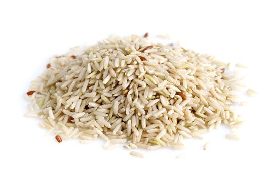 Pile of brown rice isolated on white background