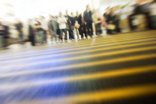 Busy street in Hong Kong. Purposely blurred with a lens.