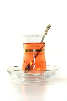 a cup of tea on a white background