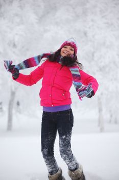 winter women jump in snow