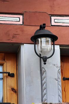 old retro light of a house with door