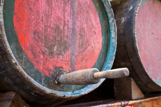 Italy - old tap on a barrel of Barbera wine, Piedmont region