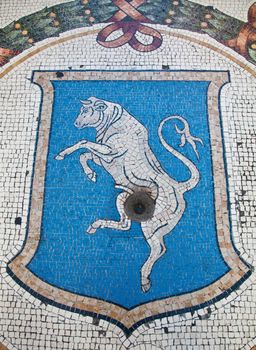 Italy, Milan. The Milanese tradition that is saying that if you turn quickly 3 times on your heel over the bull's testicles you attract good luck