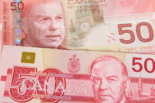 Old and new Canadian fifty dollar notes