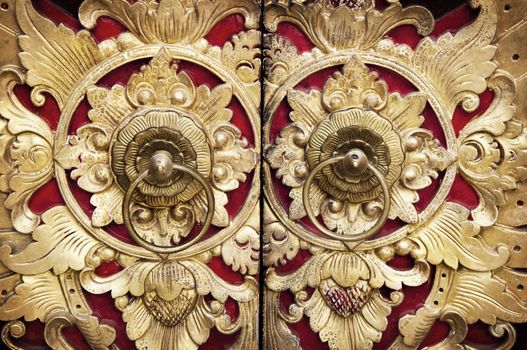 Ornate Entrance Door To Temple In Bali.