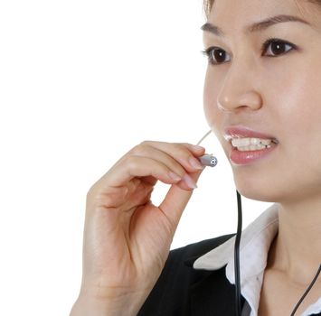 Friendly Customer Representative with headset smiling during a telephone conversation