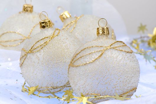 Christmas ball baubles with silver and gold decoration.