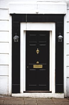 Black and white wooden door part of a home