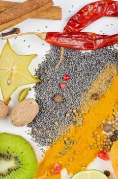 Colorful spices on a white background - beautiful kitchen image.