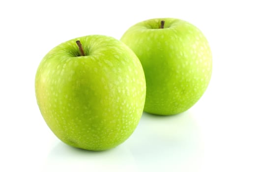 Two Granny Smith apple on white background