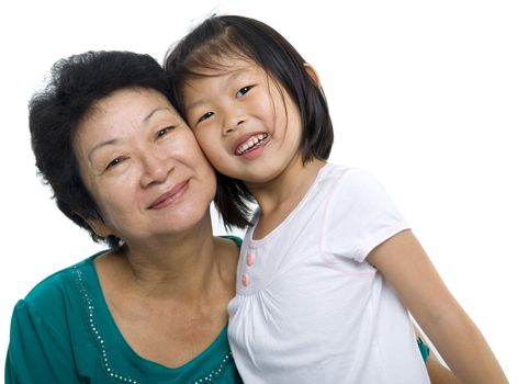 Asian grandmother and grandchild on white background