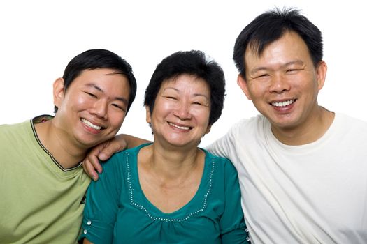 Senior mother and adult sons on white background