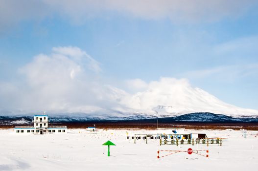 Military training base against a volcano in Russia