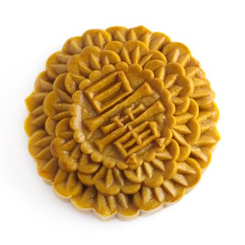 Chinese Mooncake isolated over white background, the Chinese words on the mooncake means yolk.