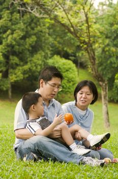 Asian family having fun at outdoor