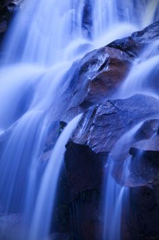 Nature waterfall in a early morning, bluetone.