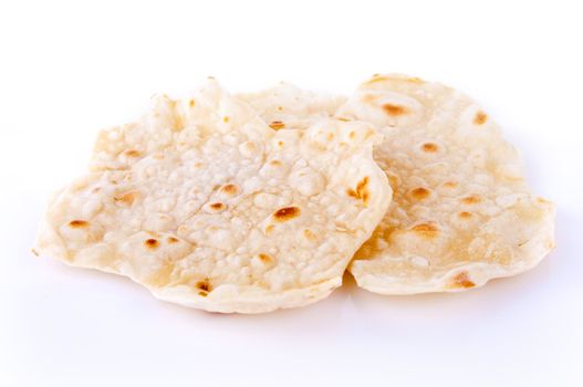 Indian staple food made of wheat flour, traditional unleavened bread to eat with curry.