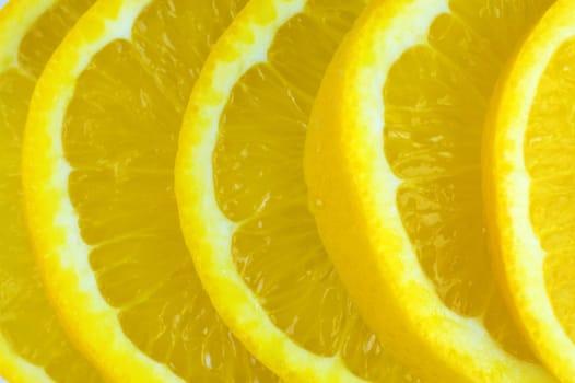 Macro on orange slices background 

