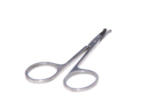 Stainless steel scissors on isolated white background