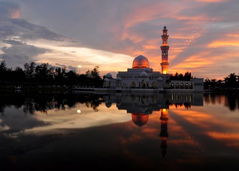 Masjid Tengku Tengah Zaharah or also known as Floating Mosque in Kuala Terengganu, Malaysia with reflection.