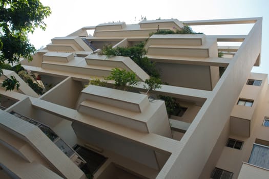 Modern design luxurious executive apartments city condominium building with green gardens