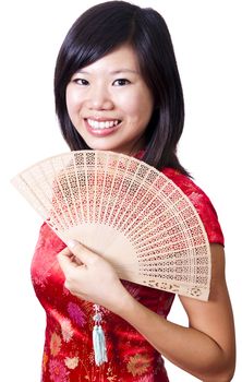 Oriental girl with Chinese traditional dress Cheongsam and Chinese Fan