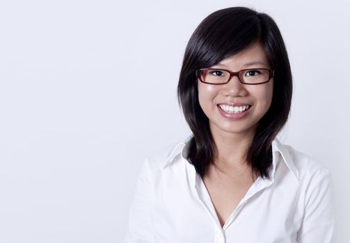 Young Asian college student with her smiling face.