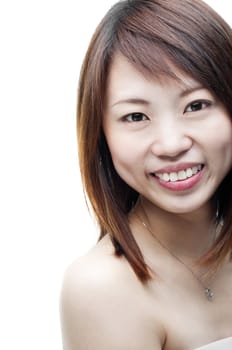 Close up of smiling Asian woman on white background