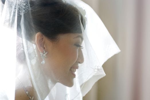 Beautiful Asian bride with smiling.