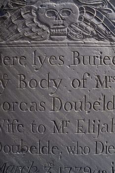 Background image of an old headstone from 1779. Film scan.