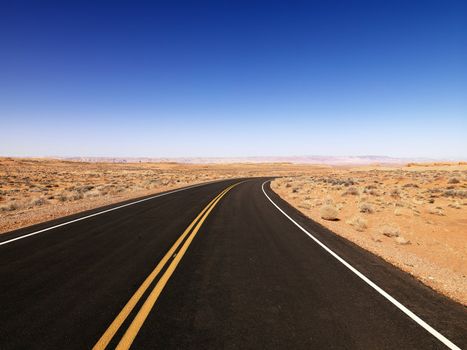 Scenic landscape of desert highway in rural Arizona, United States.
