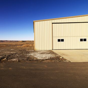 Industrial storage building in rural Utah desert.