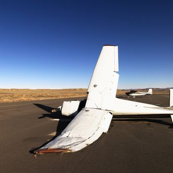 Crashed plane on tarmac at Canyonlands Field Airport, Utah, United States.