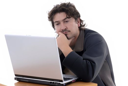 young casual man working with personal computer