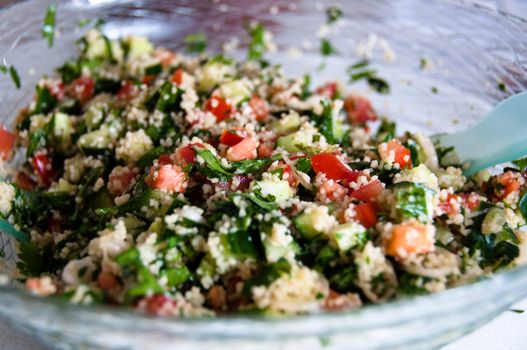 Traditional Arabian dish: Tabouleh salad with couscous, mint, tomatoes and parsley.