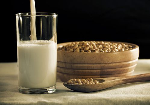 soy milk with beans in spoon