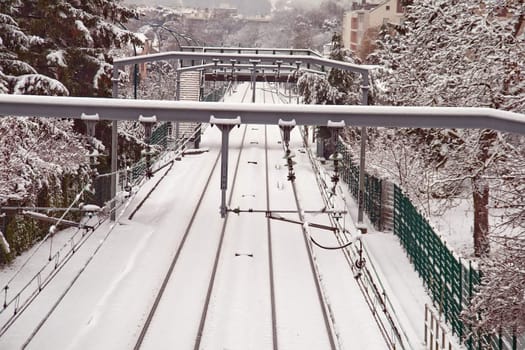 station in the Paris suburbs in the snow in winter