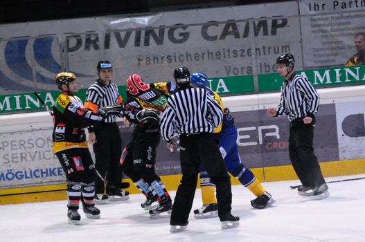 FELDKIRCH, AUSTRIA - FEB 24: Austrian National League. Fight between Jari Suorsa and Marco Ferrari. Game VEU Feldkirch vs. EK Zell am See (Result 6-0) on February 24, 2011 at hockey rink of Feldkirch