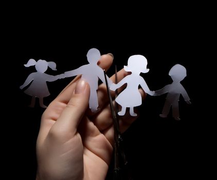 Paper chain family, divorce  on black background