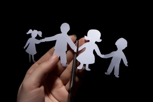 Paper chain family, divorce  on black background