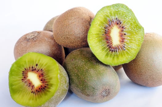 Fresh kiwi fruits on a white background