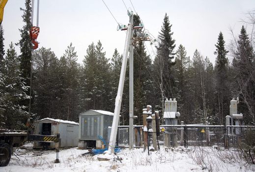 
Emergency work on the substation. Snowfall. Winter
