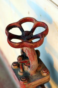 Closeup view of a red gate valve