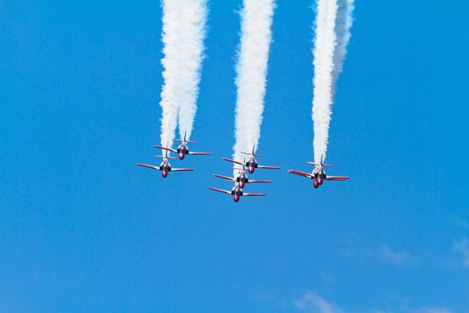 MALAGA, SPAIN-MAY 28: Aircrafts of the Patrulla Aguila taking part in an exhibition on the day of the spanish army forces on May 28, 2011, in Malaga, Spain
