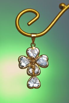 Pendant of a crucifix with five zirconia enchased