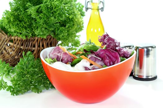 a bowl of mixed salad with fresh ingredients
