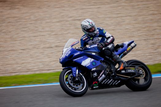 JEREZ DE LA FRONTERA, SPAIN - NOV 20: Stock Extreme motorcyclist Jorge Arroyo takes a curve in the CEV championship on Nov 20, 2010, in Jerez de la Frontera, Spain